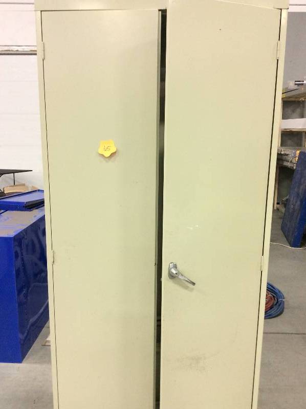 lot 65 image: large metal cabinet tan