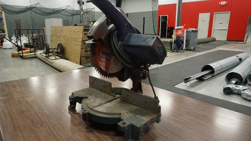 lot 27 image: Ryobi miter saw
