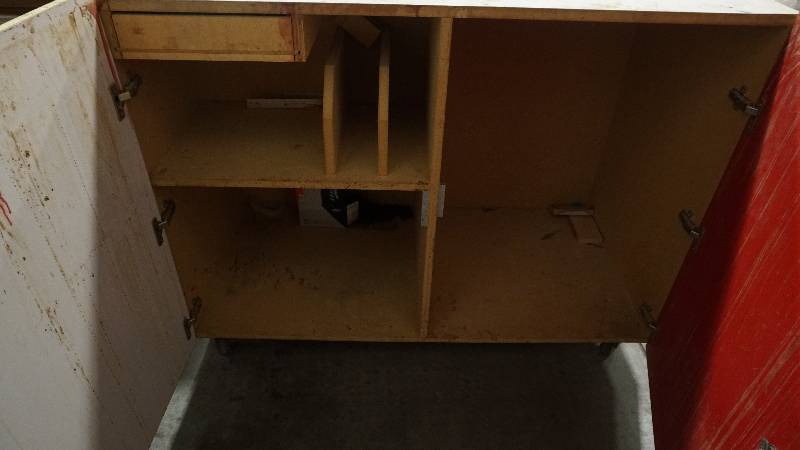 lot 94 image: Wood cabinet on wheels