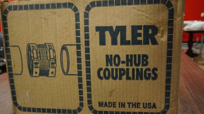 lot 100 image: box of no hub couplings