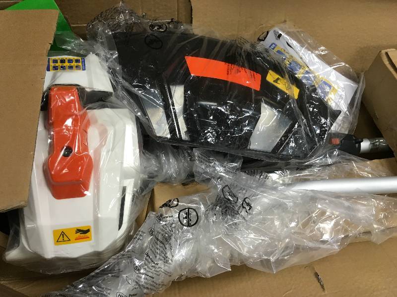 lot 83 image: MFT261  26CC 2 Cycle 4 in 1 Multi Tool with Grass Trimmer Attachment, Hedge Trimmer Attachment , Pole Saw Attachment and Brush Cutter Blade with Bonus Harness