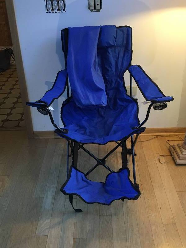 lot 30 image: Captain Chair With Footrest