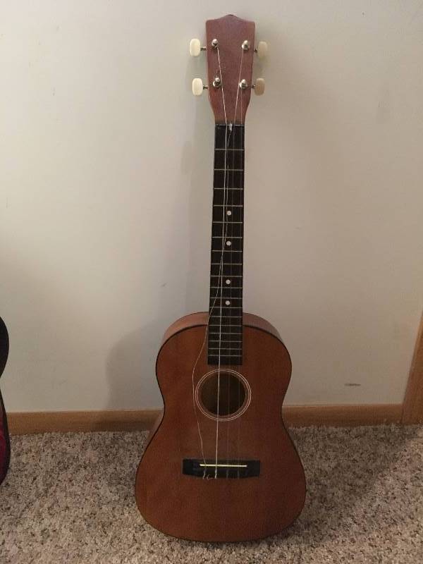 lot 90 image: Guitar with Carrying Case