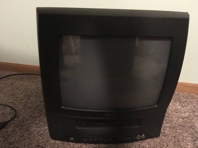 lot 302 image: RCA 12 Television with Built In VCR