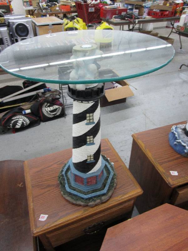 lot 89 image: Glass Light House Table