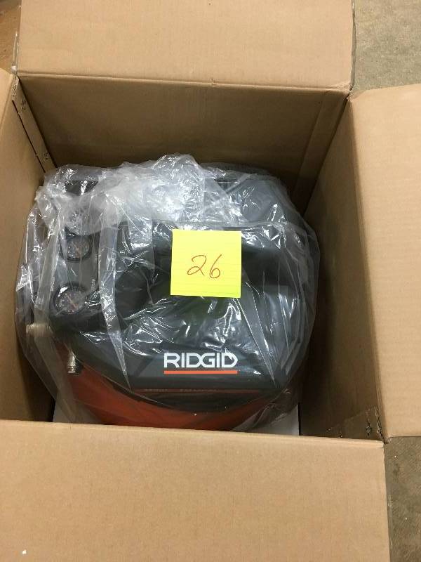 lot 26 image: Ridgid 6 gallon Pancake Air Compressor - not used