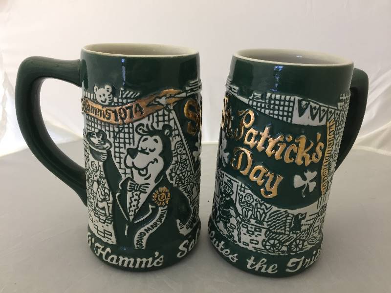 lot 8 image: Pair of Hamms Feer St Patricks Day Steins 1974