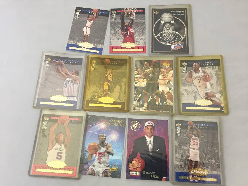 lot 31 image: Basketball Cards in Protective Sleeves