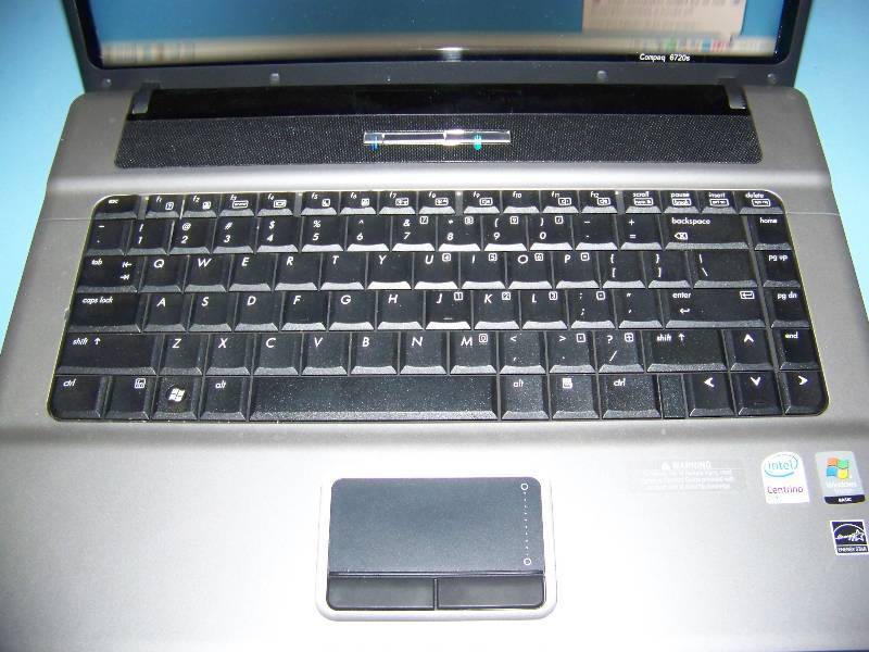 lot 16 image: Hewlett Packard (HP), Compaq, 6720s, Laptop Computer with Power Supply