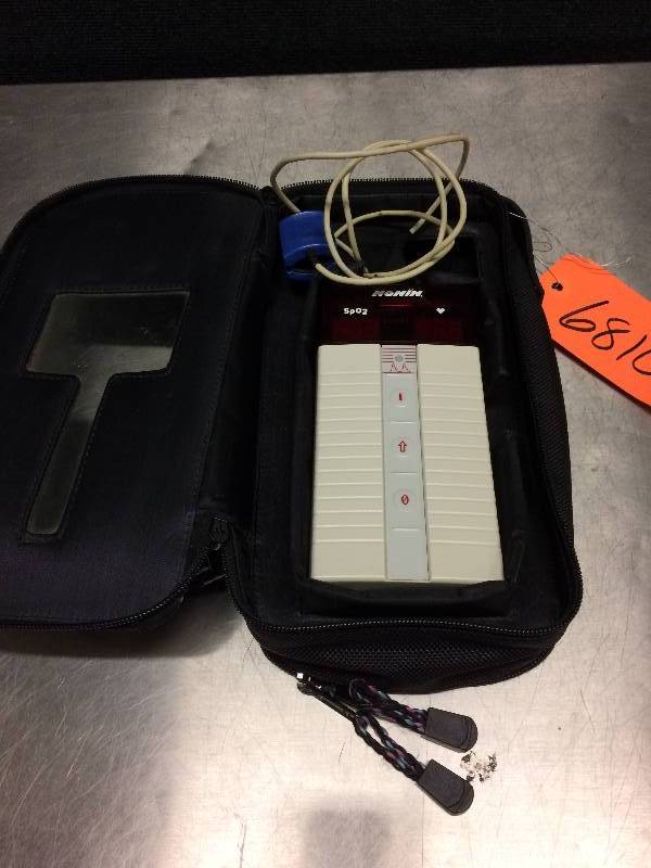 lot 27 image: Nonin 8500 Hand Held Pulse Oximeter with HHCC Protective Case