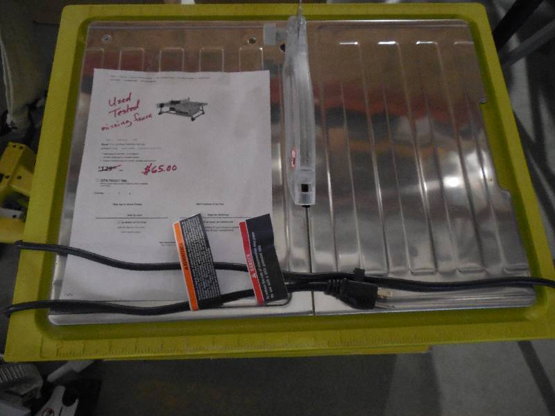 lot 78 image: Ryobi 7 in. 4.8 Amp Tabletop Tile Saw