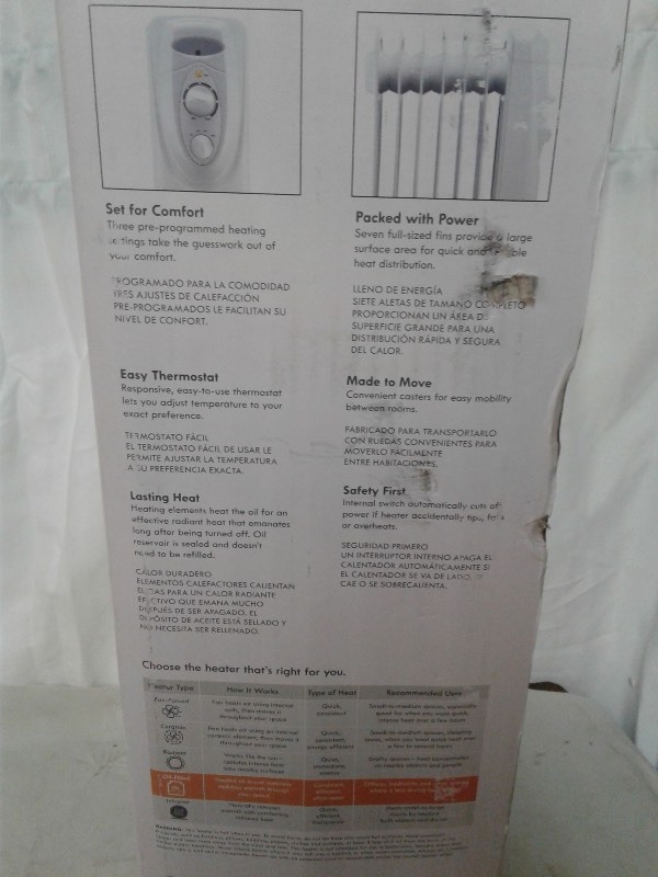 lot 23 image: Kenmore 7 Fin Oil Filled Heater