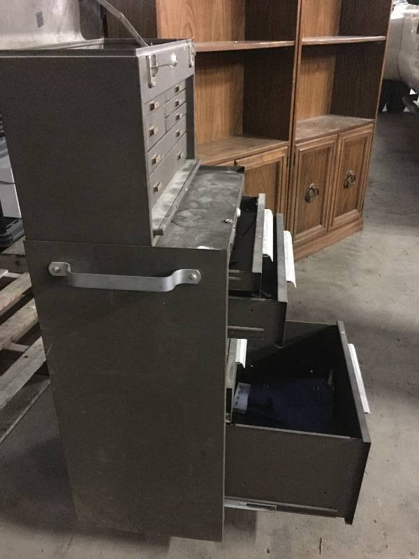 Nice old metal roll-around tool box.