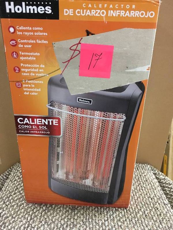Holmes Quartz Tower Heater with Manual Controls in working conditions