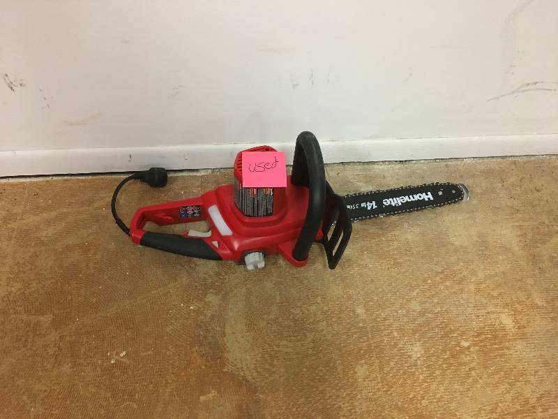 Homelite 14 in. 9 Amp Electric Chainsaw in working conditions
