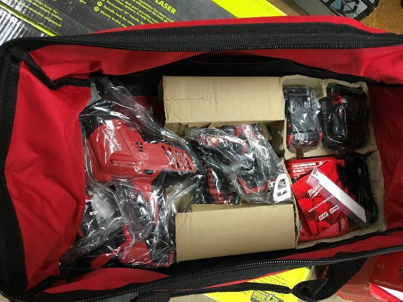 Milwaukee  M18 18-Volt Lithium-Ion Cordless Combo Tool Kit (4-Tool) w(2) 3.0Ah Batteries, (1) Charger, (1) Tool Bag not used