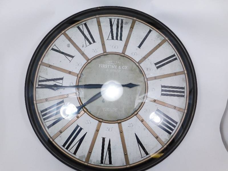 lot 34 image: First Time & Co. Clock