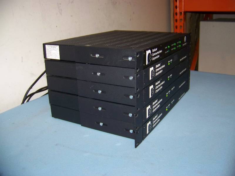 lot 136 image: Radient Communications Corporation, (2) Transmitters, (2) Receivers and (1) Multiplexer