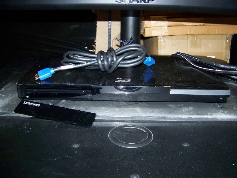 lot 4 image: 65, Sharp, Commercial Grade, LCD, HDTV with Remote Control on a Rolling TV (AV) Cart with Various Components