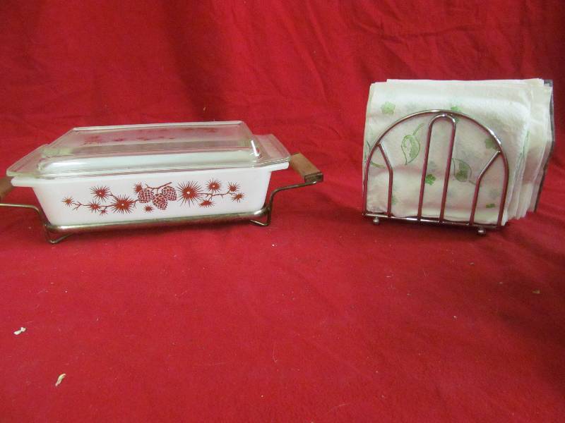 Pyrex casserole dish with serving frame, napkin holder, napkins