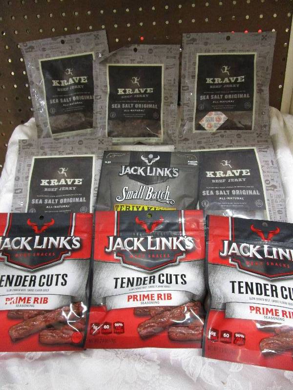 Box full of  9 bags of jerky  Shelf Pulled Items