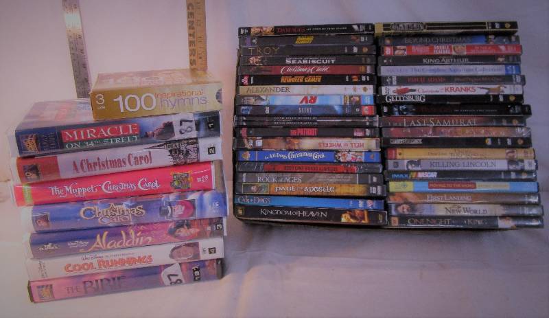 38 DVD and Disney VHS Tapes and some CDs50 pieces
