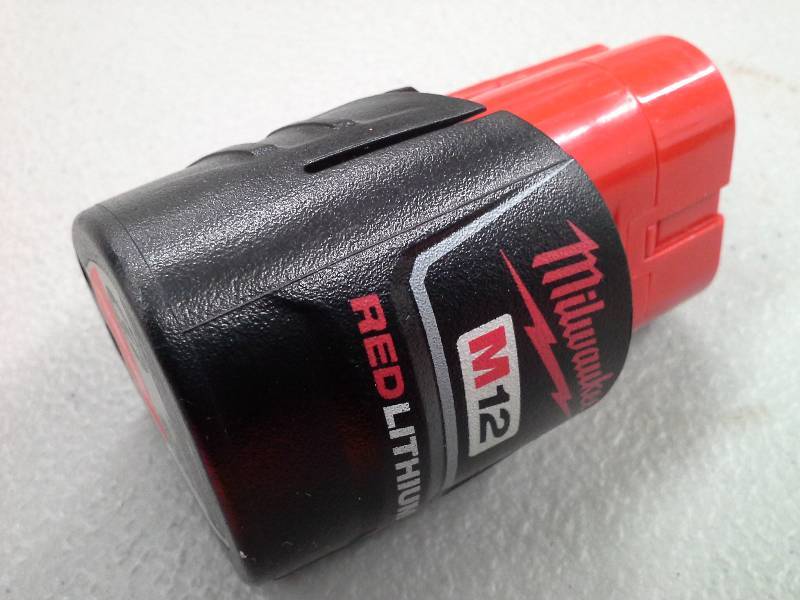 lot 104 image: Milwaukee M12 Red Lithium Battery