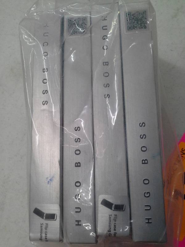 lot 165 image: (4) Hugo Boss Cell Phone Case