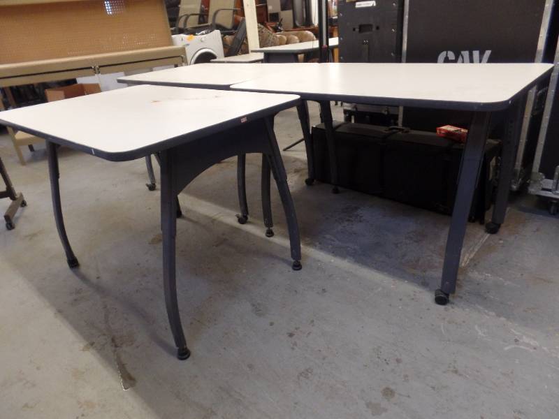 lot 502 image: ROLLING ADJUSTABLE HEIGHT TABLES