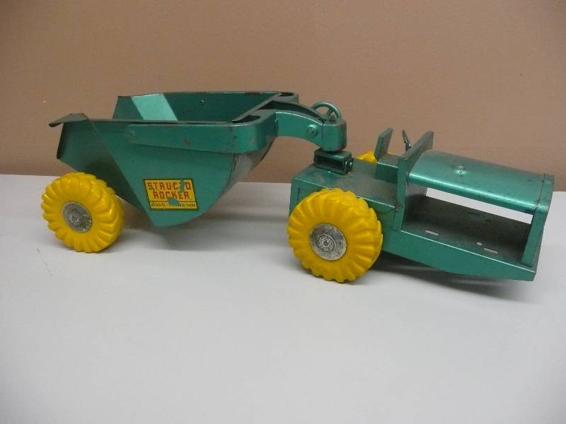 lot 44 image: VINTAGE STAMPED STEEL STRUCTO-ROCKER (rare yellow wheels. rare green paint.) - SEE PICTURES