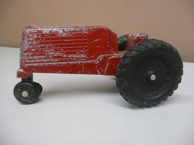 lot 47 image: Vintage Aluminum Red Farm Tractor - Slik Toys Lansing, Iowa - SEE PICTURES