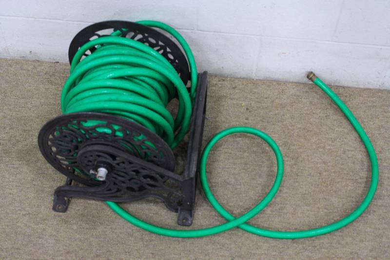 lot 143 image: Garden Reel and Hose