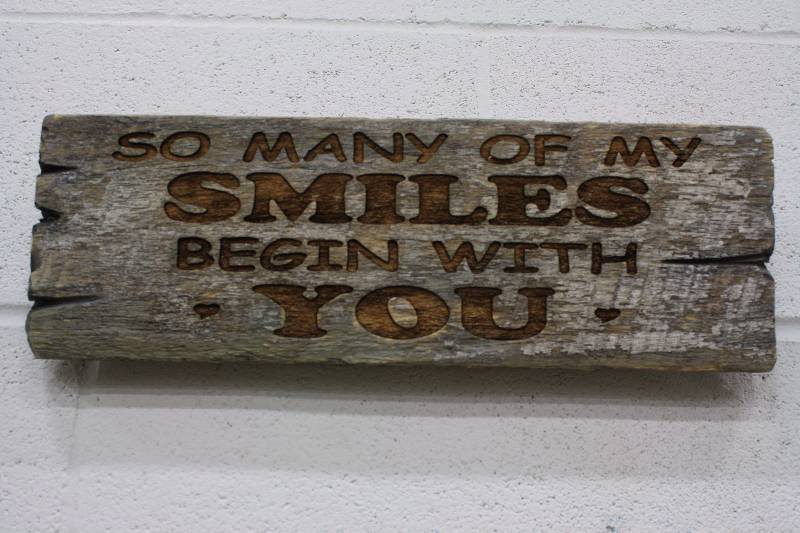lot 114 image: Wood SIgn So many of my smiles begin with you