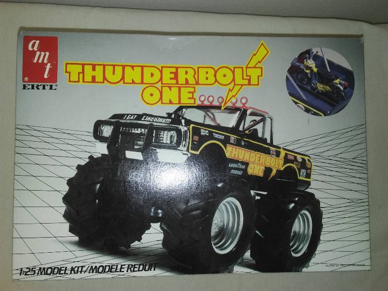 lot 14 image: NIB AMT ERTL Thunderbolt One Chevy Pickup Truck, Monster Truck 6609