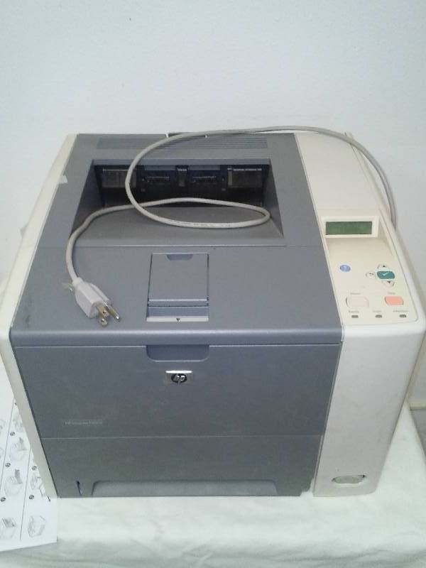 lot 53 image: HP Laser Jet P3005 Printer up and running,