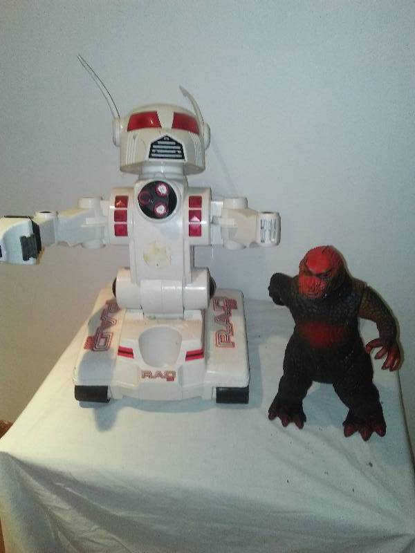 lot 127 image: RAD 2.0 and Godzilla toys, RAD is about 18 in. Tall