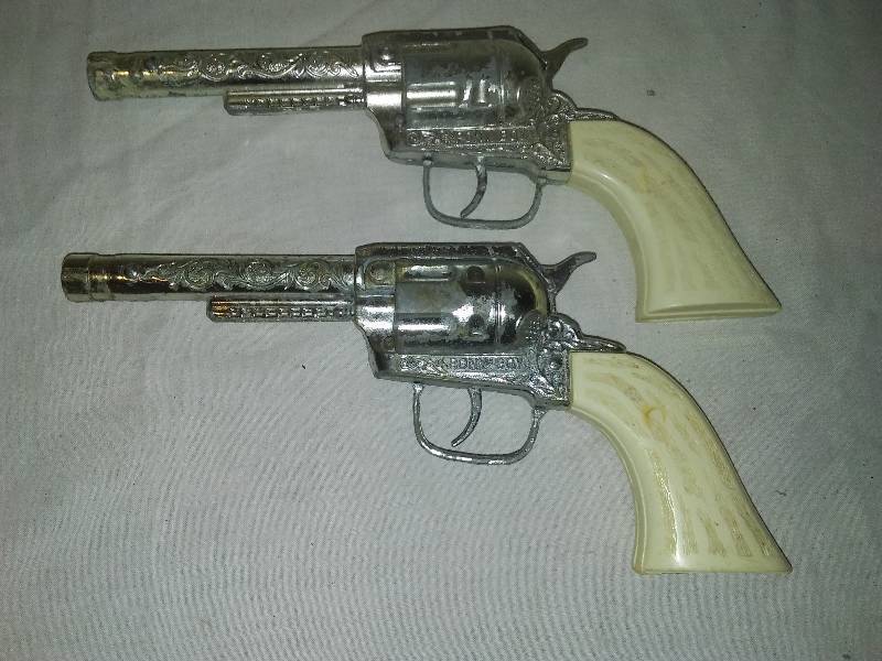 lot 132 image: 2 Pony Boy 10 Cap Guns  Good Condition