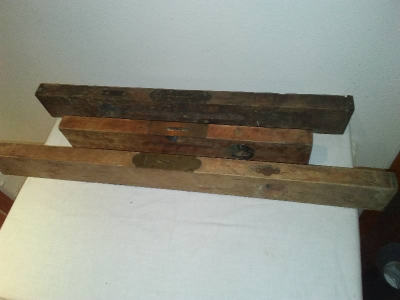 lot 149 image: 3 Vintage Wood Level  all have glass and bubbles, 30, 28, and 20 in.