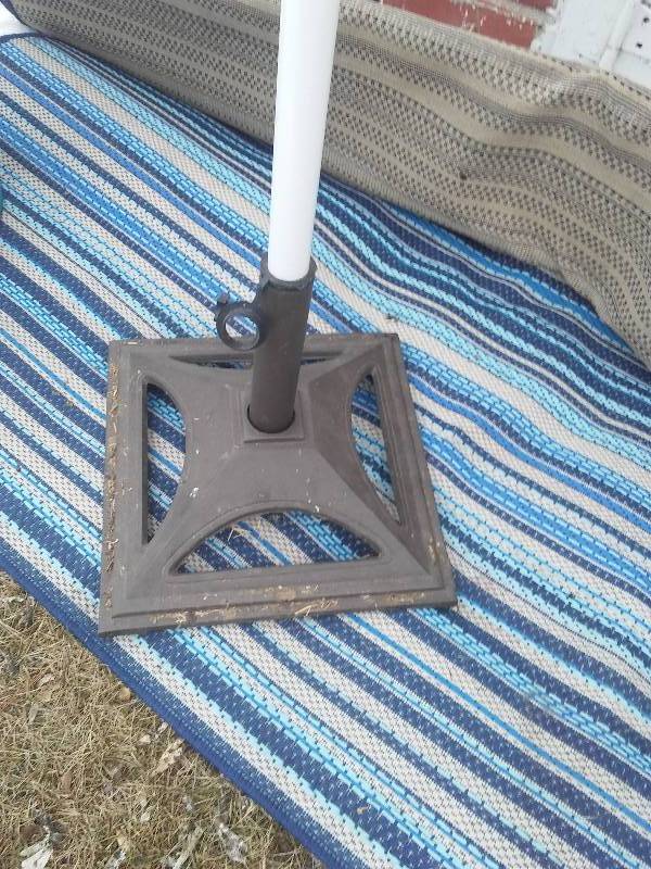 lot 33 image: Patio Accessories, Umbrella with stand, area rug  and more
