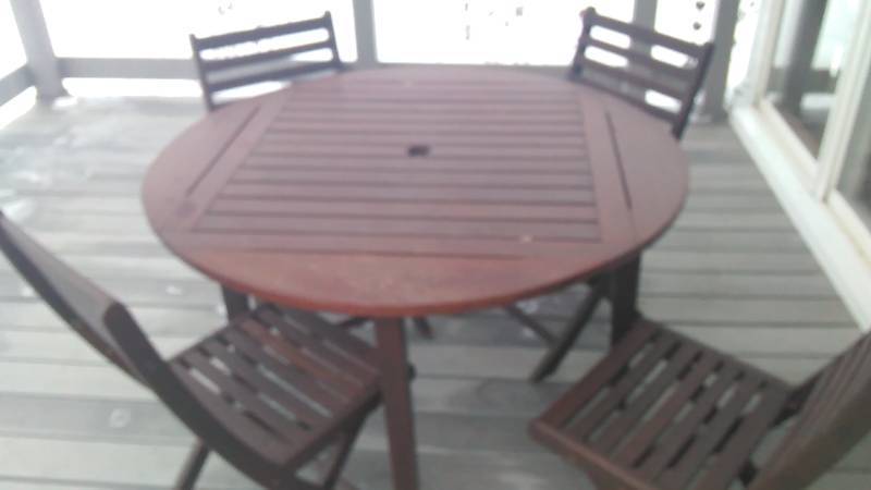 lot 49 image: Brazilian Teakwood Table and Wood Chairs (4)