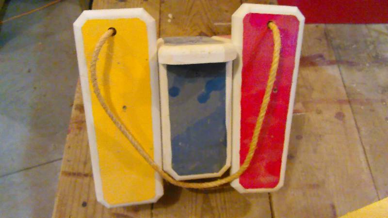 lot 76 image: Hand Crafted Multi Colored Flip Flop Birdhouse