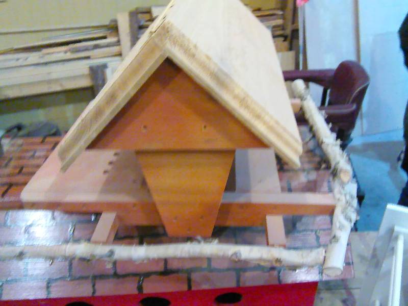 lot 73 image: Hand Crafted Bird Feeder with Birch Accents