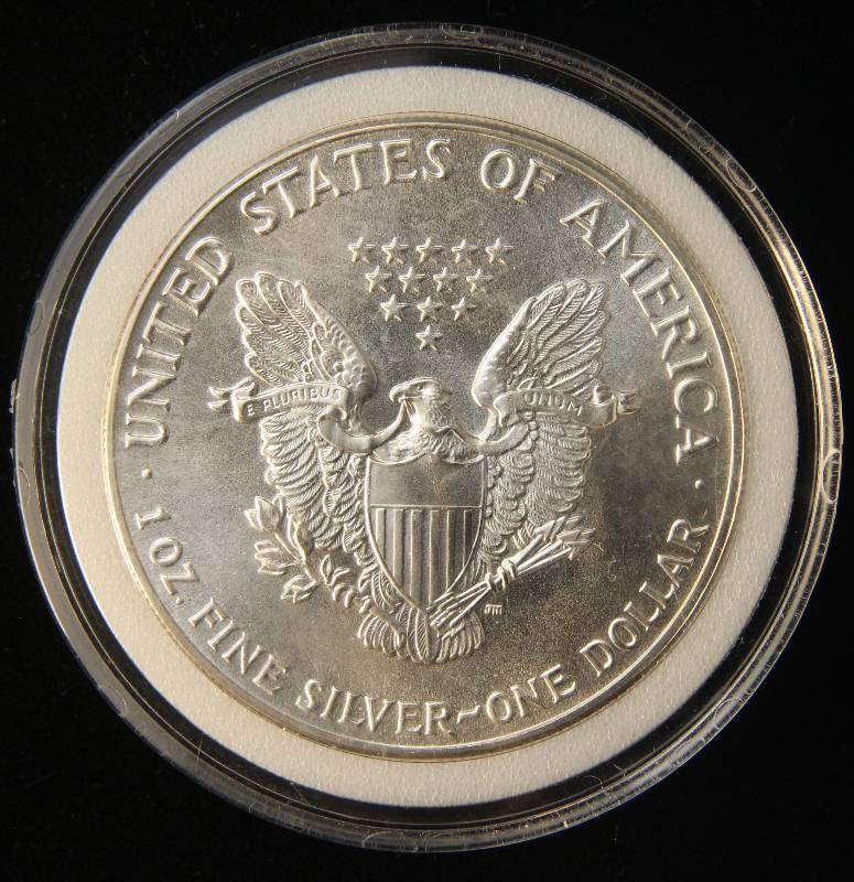 1986 AMERICAN SILVER EAGLE 1 TROY OZ. .999 FINE SILVER IN AIRTITE