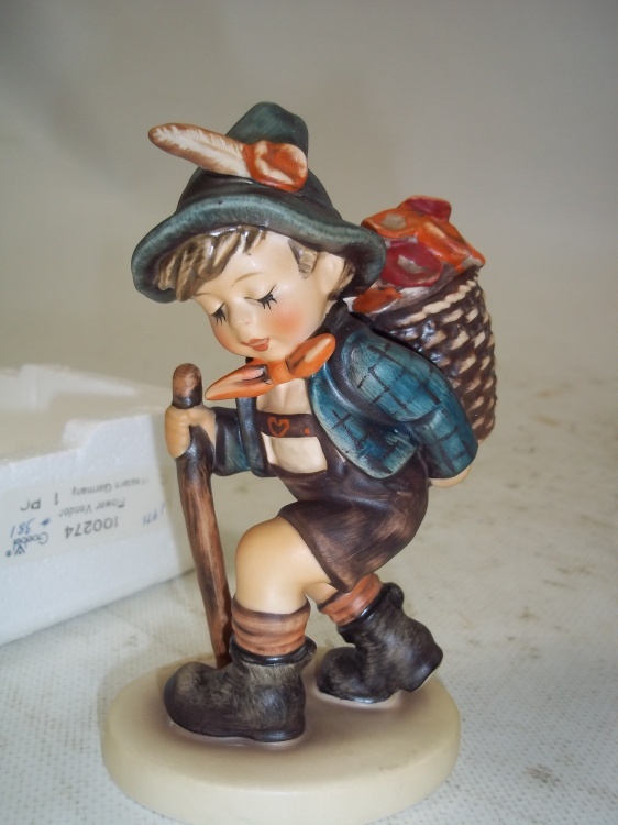lot 32 image: Vintage Goebel Hummel The Flower Vendor 1960s