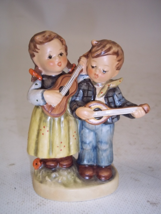 lot 33 image: Vintage Goebel Hummel  Happy Days  1960s