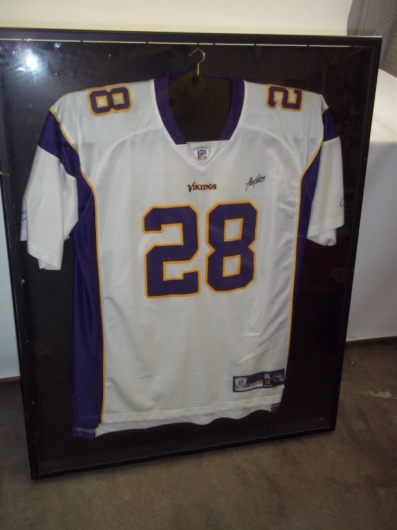 lot 51 image: Frames Vikings Jersey Adrian Peterson 33 x 41