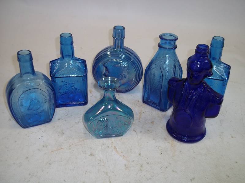 lot 62 image: Vintage Blue Glass Bottles