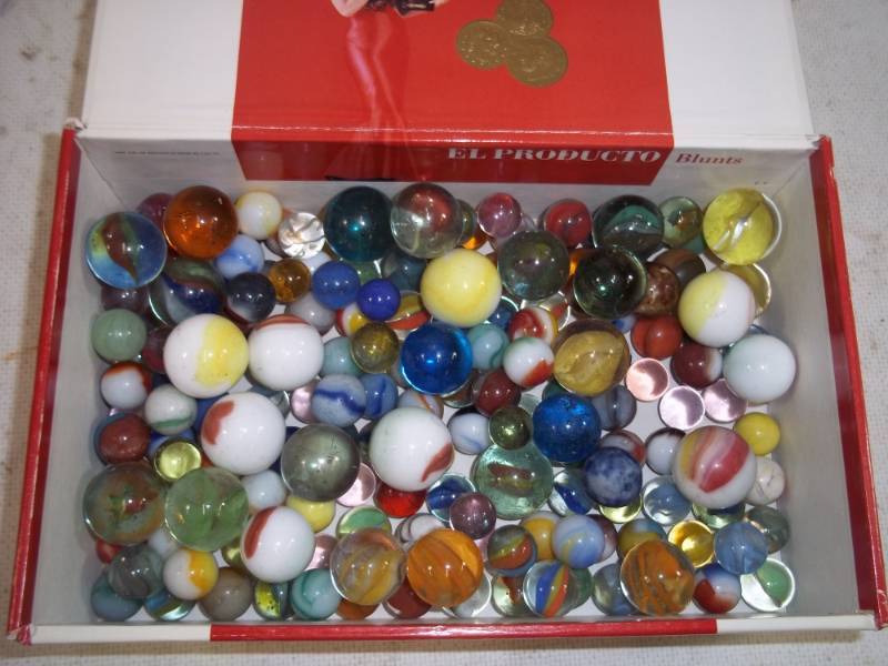 lot 95 image: Cigar Box Full of Marbles with Shooters