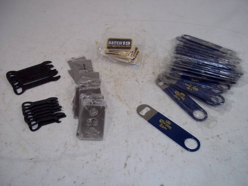 lot 184 image: 21  Batch 19 Patches and Batch 19 Openers and Corona Openers Total 52 Openers