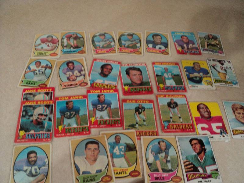 27 football cards in sleeves from 1...